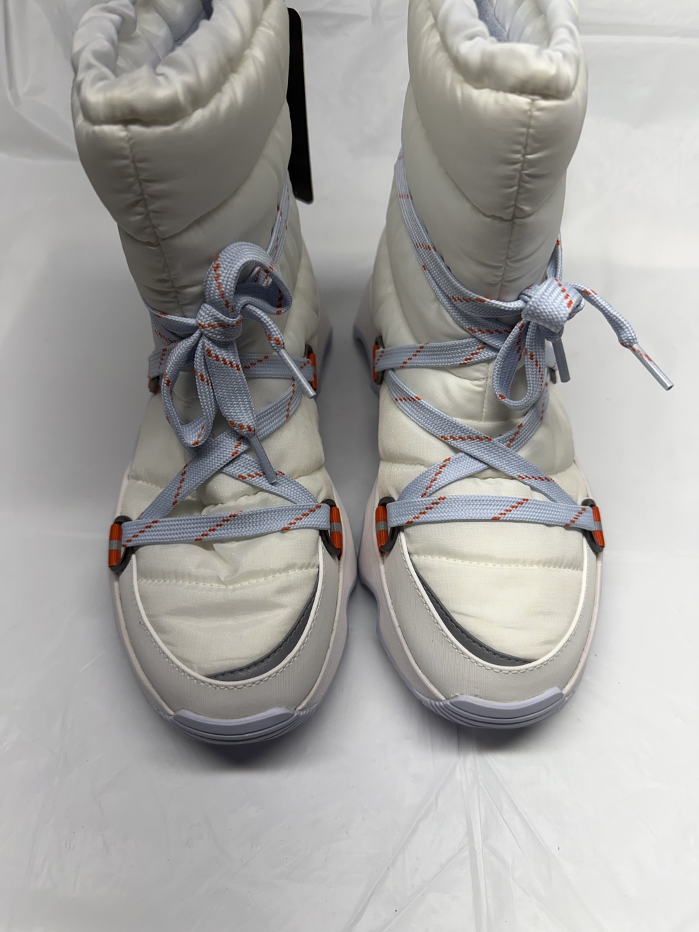 Sorel Women's White Winter Puffer Boots with Light Blue Laces and Orange Accents